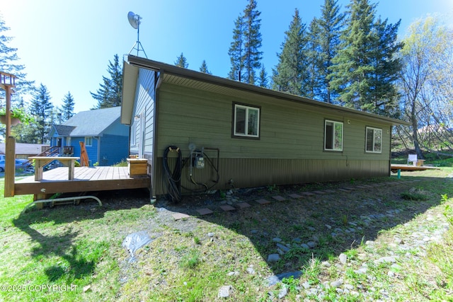 876 Lupine Ct, Homer, AK 99603 - view of property exterior featuring a deck