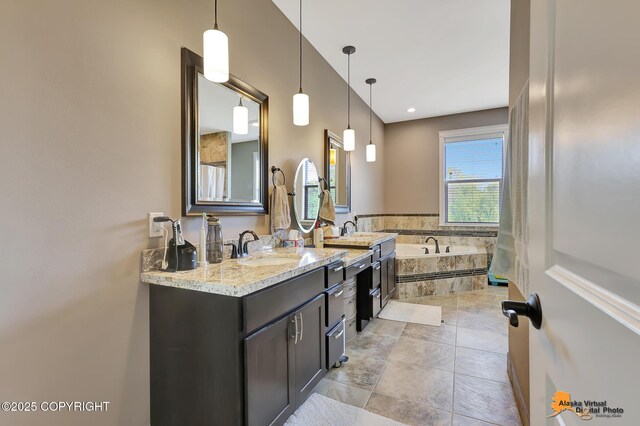 10588 E Nighthawk Cir, Palmer, AK 99645 - bathroom featuring double vanity and a garden tub