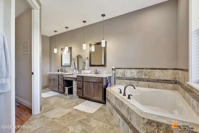10588 E Nighthawk Cir, Palmer, AK 99645 - full bathroom featuring double vanity and a garden tub