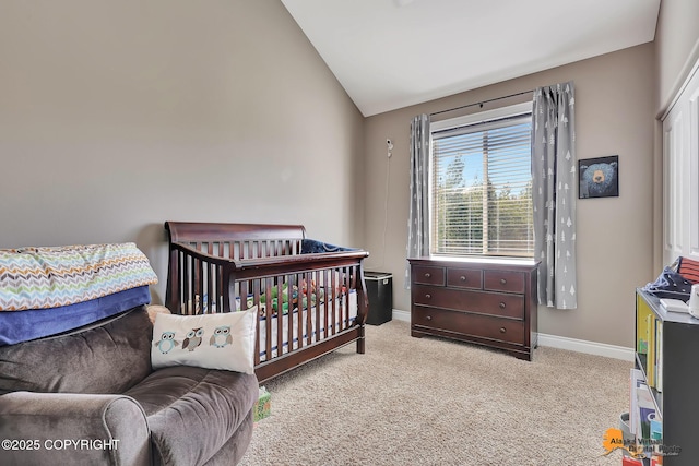 10588 E Nighthawk Cir, Palmer, AK 99645 - carpeted bedroom with lofted ceiling, baseboards, and a nursery area