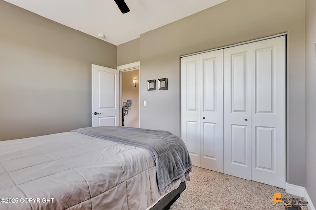 10588 E Nighthawk Cir, Palmer, AK 99645 - bedroom featuring a closet, dark aggregate flooring, a ceiling fan, and baseboards