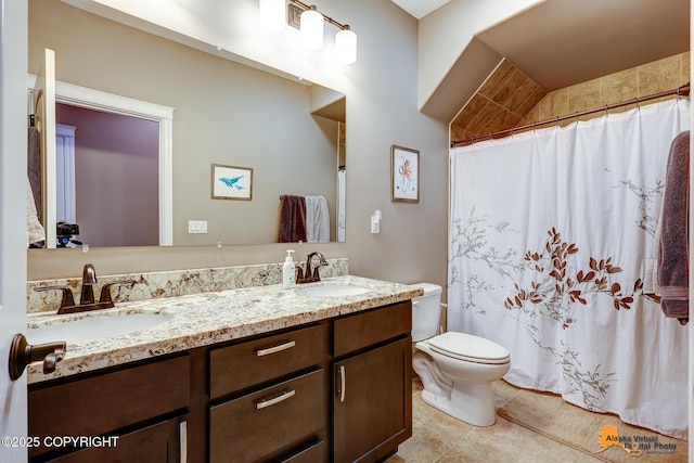 10588 E Nighthawk Cir, Palmer, AK 99645 - bathroom featuring double vanity, toilet, tile patterned floors, and curtained shower