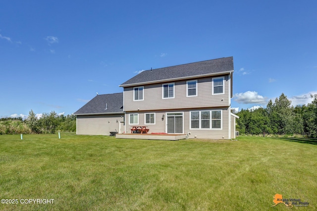 10588 E Nighthawk Cir, Palmer, AK 99645 - back of property featuring a yard, a deck, and roof with shingles
