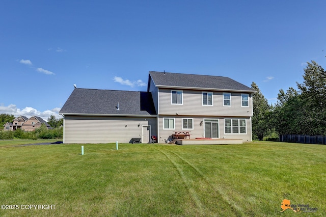 10588 E Nighthawk Cir, Palmer, AK 99645 - rear view of house with a lawn