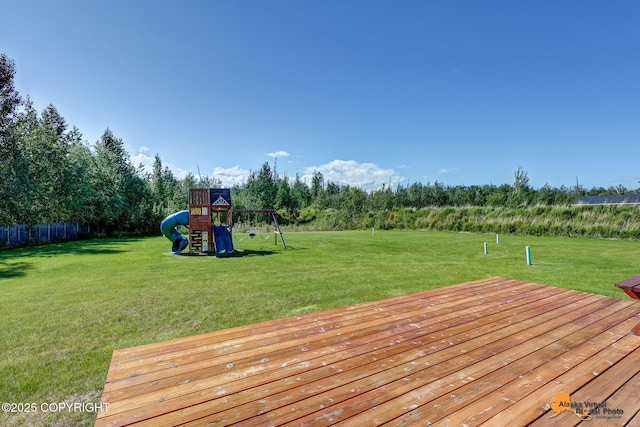 10588 E Nighthawk Cir, Palmer, AK 99645 - wooden deck featuring a playground