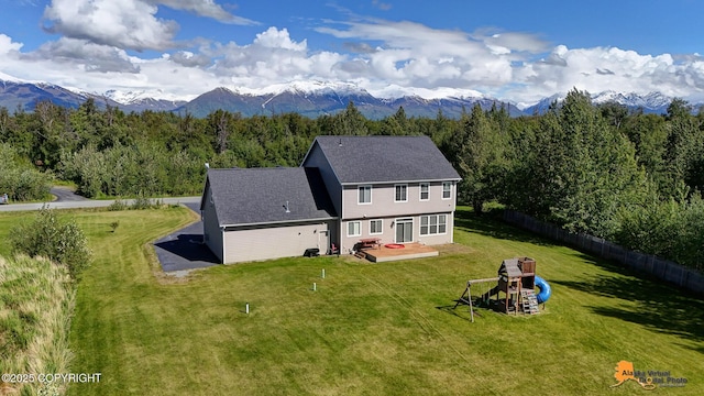 10588 E Nighthawk Cir, Palmer, AK 99645 - view of subject property with mountains and a heavily wooded area