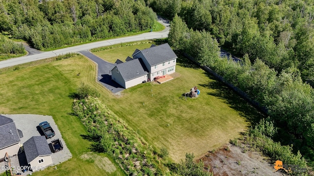 10588 E Nighthawk Cir, Palmer, AK 99645 - aerial view of property and surrounding area featuring a heavily wooded area