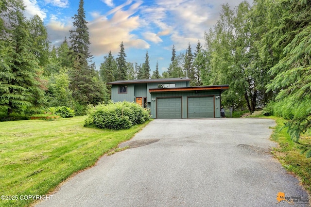 11721 Wranglers Way, Anchorage, AK 99516 - view of front of home with driveway, a front yard, and a garage