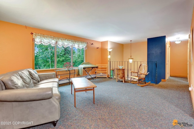 11721 Wranglers Way, Anchorage, AK 99516 - carpeted living area with a baseboard heating unit