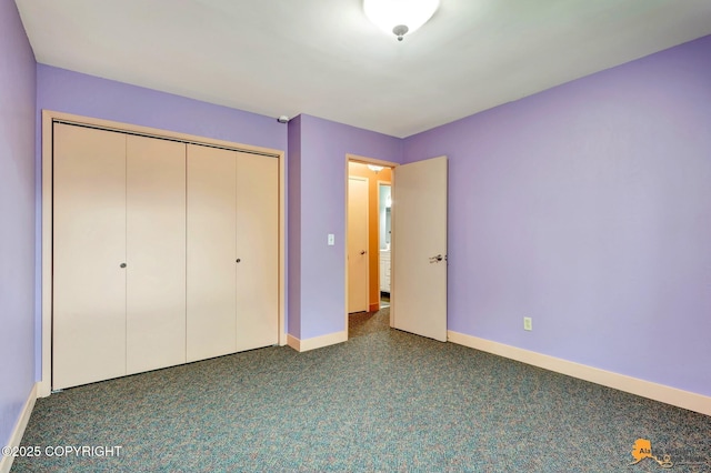11721 Wranglers Way, Anchorage, AK 99516 - unfurnished bedroom featuring a closet and carpet floors