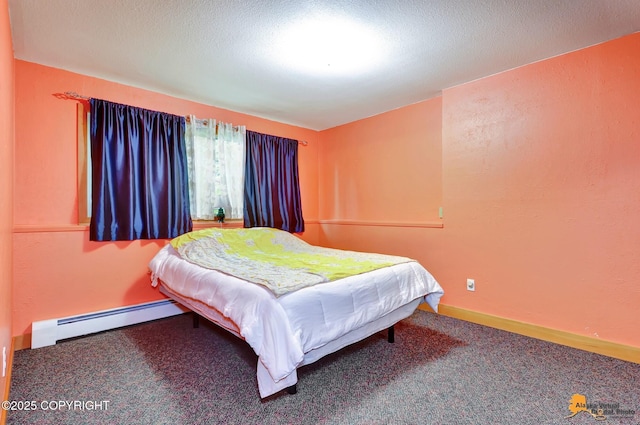 11721 Wranglers Way, Anchorage, AK 99516 - bedroom featuring a baseboard heating unit and carpet