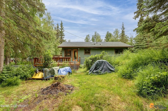 11721 Wranglers Way, Anchorage, AK 99516 - back of house with a wooden deck