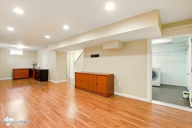 basement featuring washer / dryer, light wood-type flooring, baseboards, stairs, and recessed lighting