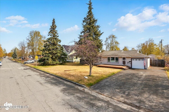 view of front of house with a garage and driveway
