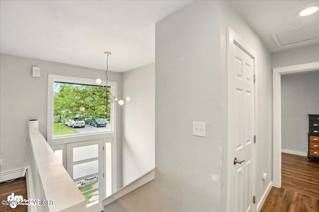 1831 S Salem Dr, Anchorage, AK 99508 - corridor with dark wood finished floors, baseboards, and an upstairs landing