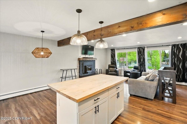 1831 S Salem Dr, Anchorage, AK 99508 - kitchen featuring wooden counters, baseboard heating, dark wood finished floors, open floor plan, and beamed ceiling