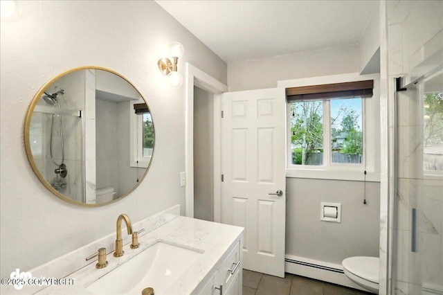 1831 S Salem Dr, Anchorage, AK 99508 - bathroom with toilet, a shower stall, vanity, tile patterned flooring, and a baseboard radiator