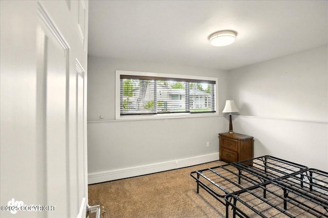 1831 S Salem Dr, Anchorage, AK 99508 - unfurnished bedroom featuring carpet, baseboards, and a baseboard heating unit
