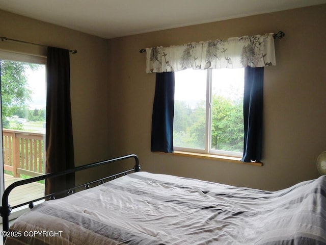 2340 E End Rd, Homer, AK 99603 - bedroom featuring multiple windows