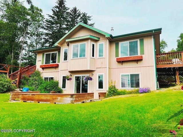 2340 E End Rd, Homer, AK 99603 - rear view of property featuring a lawn and a deck