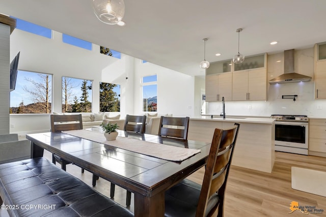 8236 Byron Dr, Anchorage, AK 99516 - dining room featuring light wood-style floors and recessed lighting