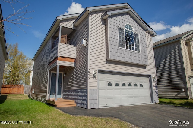 3025 Seclusion Cove Dr # 43, Anchorage, AK 99515 - traditional-style house with a balcony, an attached garage, and driveway