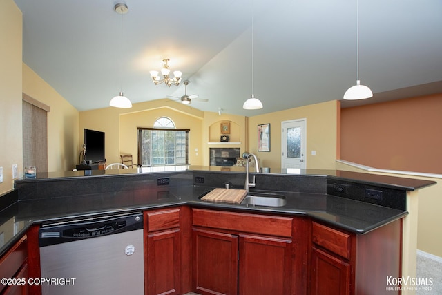 3025 Seclusion Cove Dr # 43, Anchorage, AK 99515 - kitchen featuring stainless steel dishwasher, a sink, dark countertops, open floor plan, and lofted ceiling