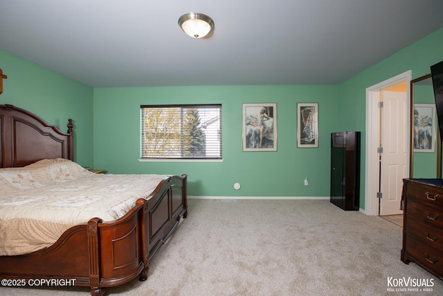 3025 Seclusion Cove Dr # 43, Anchorage, AK 99515 - bedroom with light colored carpet and baseboards