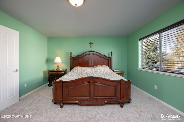 3025 Seclusion Cove Dr # 43, Anchorage, AK 99515 - bedroom featuring light colored carpet and baseboards