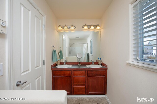 3025 Seclusion Cove Dr # 43, Anchorage, AK 99515 - bathroom featuring double vanity and a shower