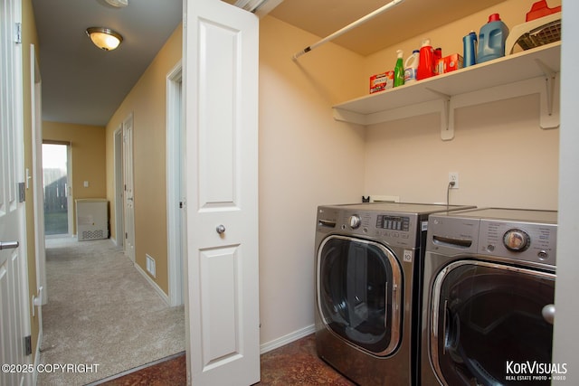 3025 Seclusion Cove Dr # 43, Anchorage, AK 99515 - clothes washing area with washing machine and dryer, baseboards, and carpet flooring