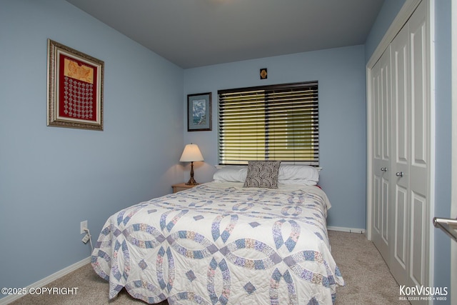 3025 Seclusion Cove Dr # 43, Anchorage, AK 99515 - bedroom featuring carpet, a closet, and baseboards