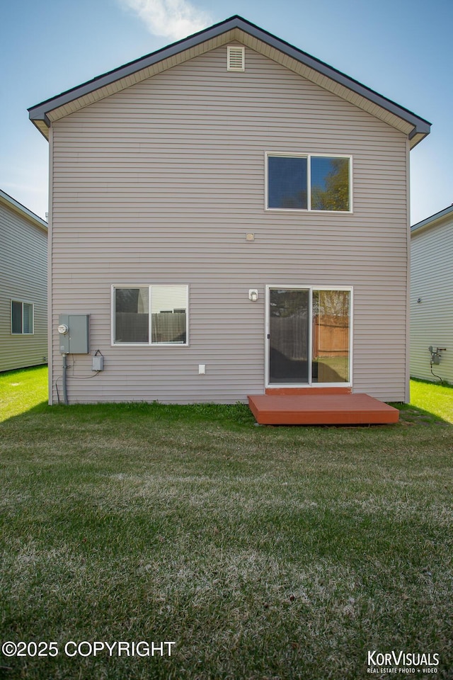 3025 Seclusion Cove Dr # 43, Anchorage, AK 99515 - back of house featuring a lawn