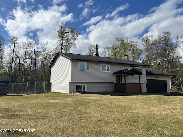 981 E Susitna Dr, Wasilla, AK 99654 - view of front of home featuring a chimney, a garage, and driveway