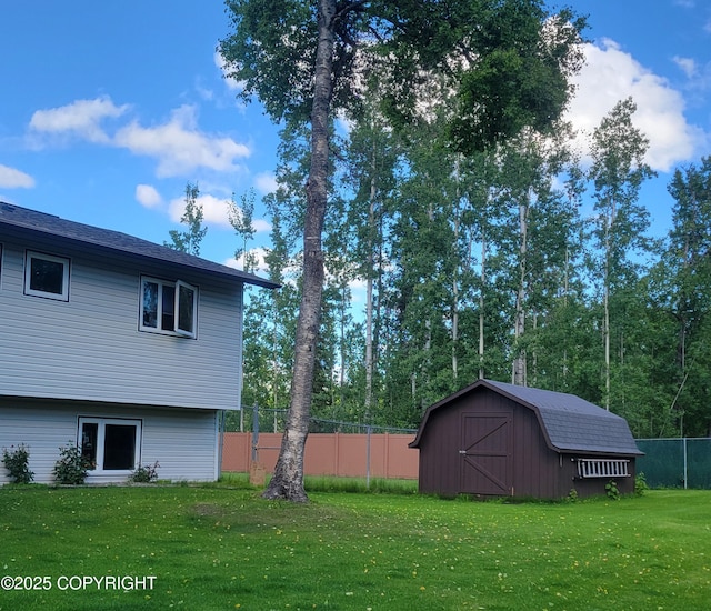 981 E Susitna Dr, Wasilla, AK 99654 - view of yard featuring an outdoor structure and a storage unit