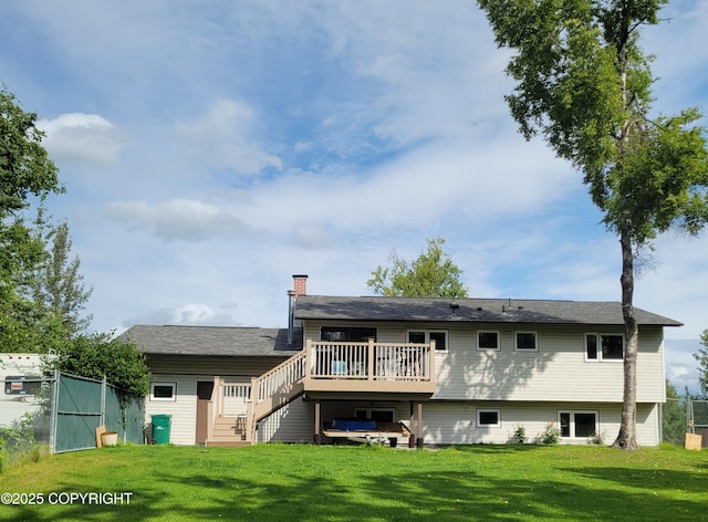 981 E Susitna Dr, Wasilla, AK 99654 - back of property with a wooden deck, stairs, and a chimney