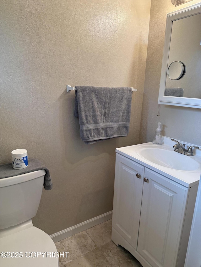 981 E Susitna Dr, Wasilla, AK 99654 - bathroom featuring vanity and toilet