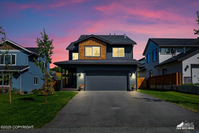 2945 Morgan Loop, Anchorage, AK 99516 - view of front of home with asphalt driveway and a garage