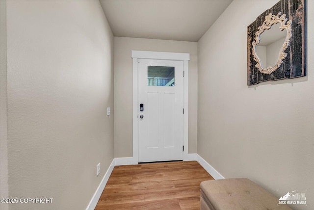 2945 Morgan Loop, Anchorage, AK 99516 - doorway with wood finished floors and baseboards