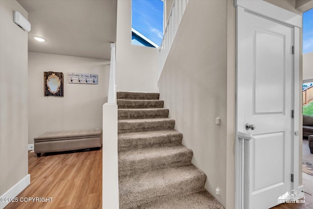 2945 Morgan Loop, Anchorage, AK 99516 - stairway with wood finished floors, baseboards, and recessed lighting
