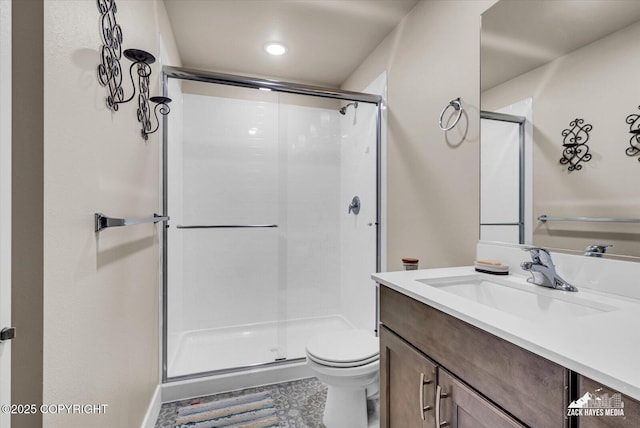 2945 Morgan Loop, Anchorage, AK 99516 - bathroom featuring vanity, toilet, and a stall shower