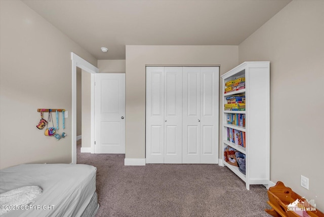 2945 Morgan Loop, Anchorage, AK 99516 - carpeted bedroom featuring a closet and baseboards
