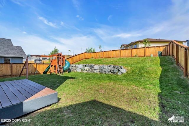 2945 Morgan Loop, Anchorage, AK 99516 - view of yard featuring a playground and a wooden deck