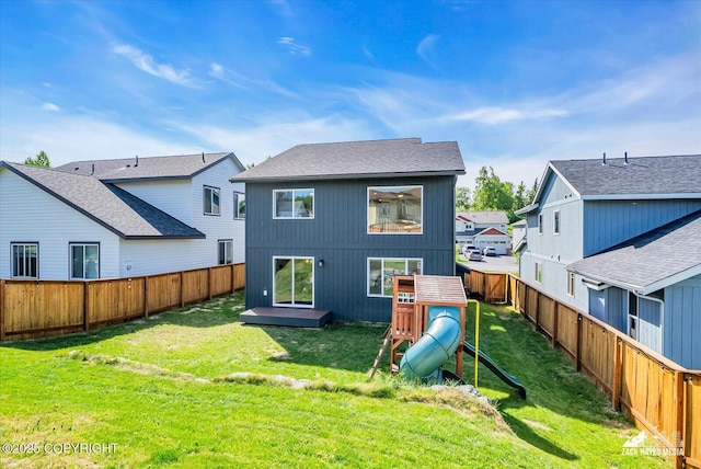 2945 Morgan Loop, Anchorage, AK 99516 - rear view of property featuring a playground, a deck, and a residential view