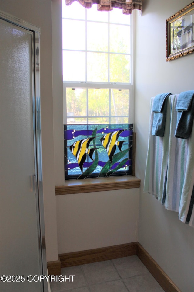 interior space featuring baseboards