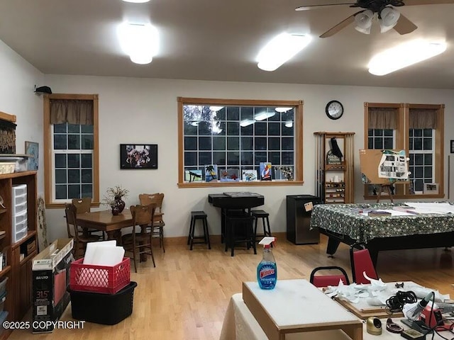 recreation room featuring wood finished floors and a ceiling fan