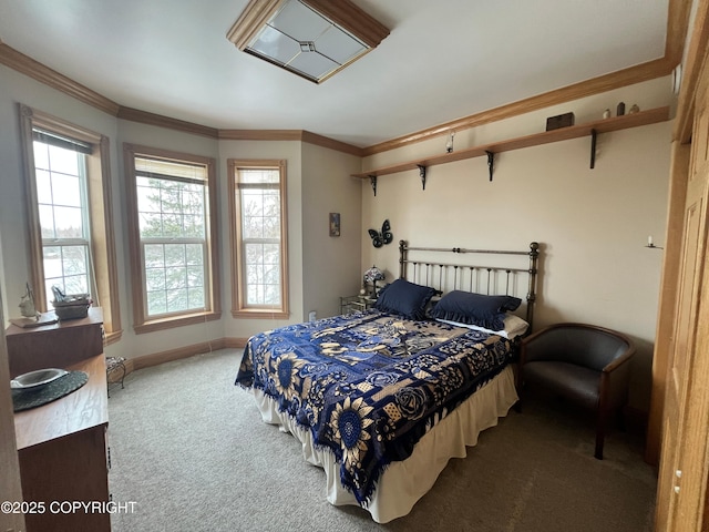 bedroom featuring carpet, crown molding, and baseboards
