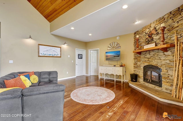 living room with hardwood / wood-style floors, vaulted ceiling, wooden ceiling, baseboards, and recessed lighting