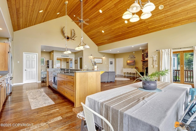 dining room featuring wood ceiling, high vaulted ceiling, wood-type flooring, recessed lighting, and a chandelier