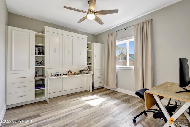 home office with light wood-type flooring, baseboards, and ceiling fan